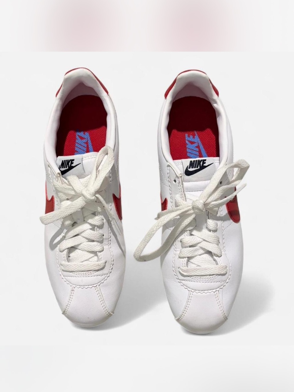 Nike White Sneakers with Red Interior Accents